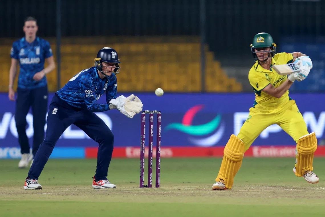 Cricket - ICC Women's World Cup - England v Australia - Holkar Cricket Stadium, Indore, India - October 22, 2025 Australia's Ashleigh Gardner in action with England's Amy Jones REUTERS/Sahiba Chawdhary