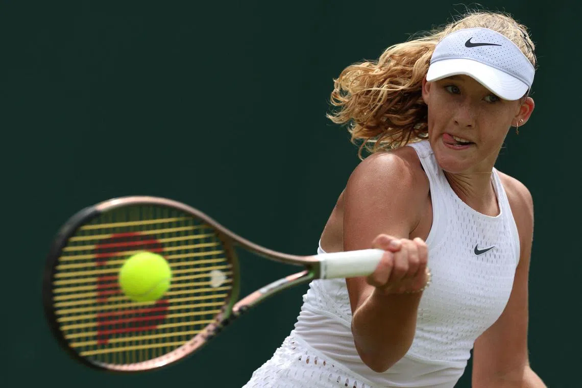 Russia's Mirra Andreeva returning the ball to Russia's Anastasia Potapova during their women's singles tennis match on the seventh day of the 2023 Wimbledon Championships at The All England Tennis Club in Wimbledon on Sunday. She won 6-2, 7-5.