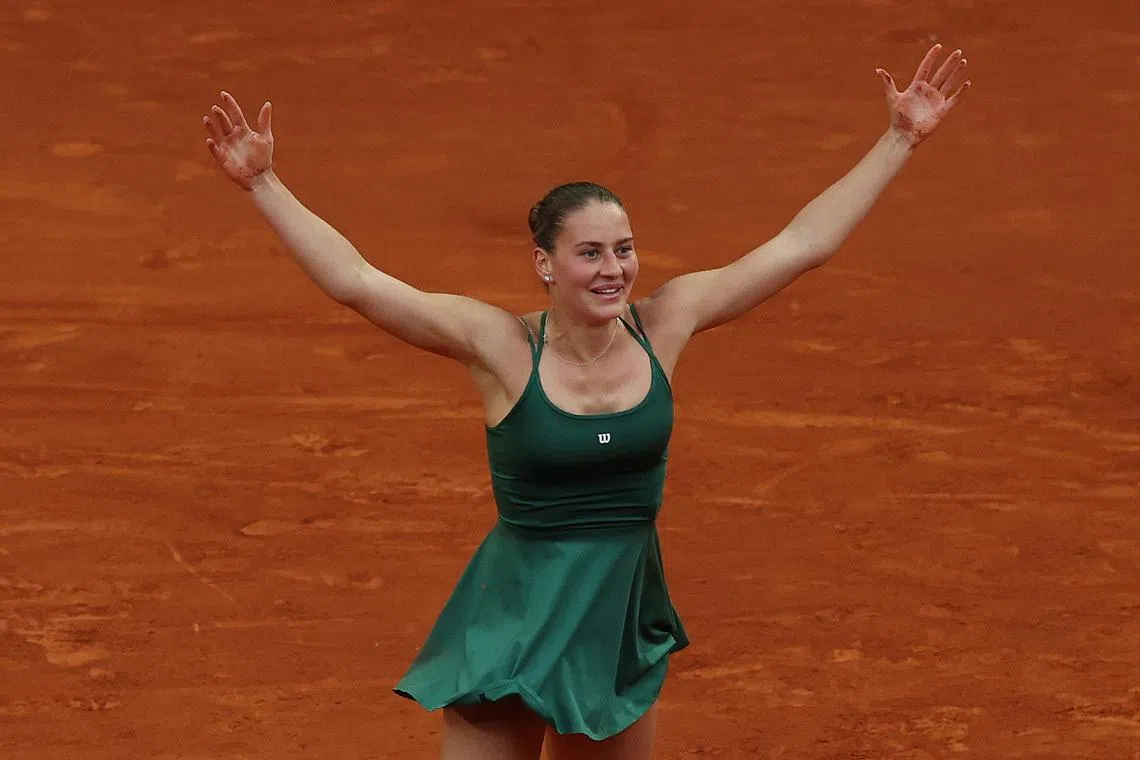 Tennis - Madrid Open - Park Manzanares, Madrid, Spain - May 2, 2026 Ukraine's Marta Kostyuk celebrates winning her final match against Russia's Mirra Andreeva REUTERS/Violeta Santos Moura