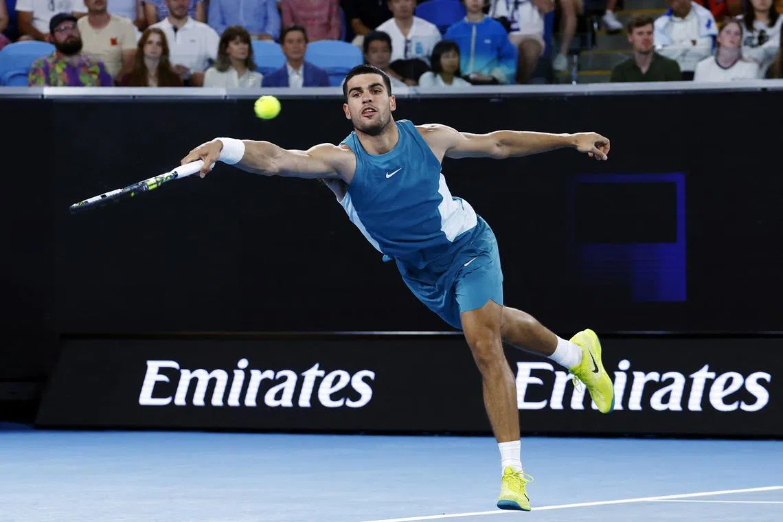 Tennis - Australian Open - Melbourne Park, Melbourne, Australia - January 13, 2025 Spain's Carlos Alcaraz in action during his first round match against Kazakhstan's Alexander Shevchenko REUTERS/Kim Kyung-Hoon