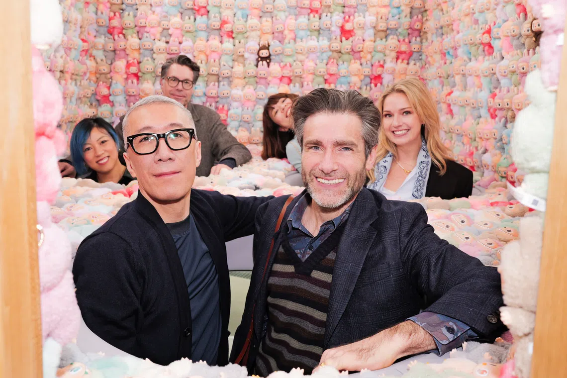 Director-writer Paul King (right) will helm the Labubu movie and artist Kasing Lung (left), who created the character, will serve as executive producer.