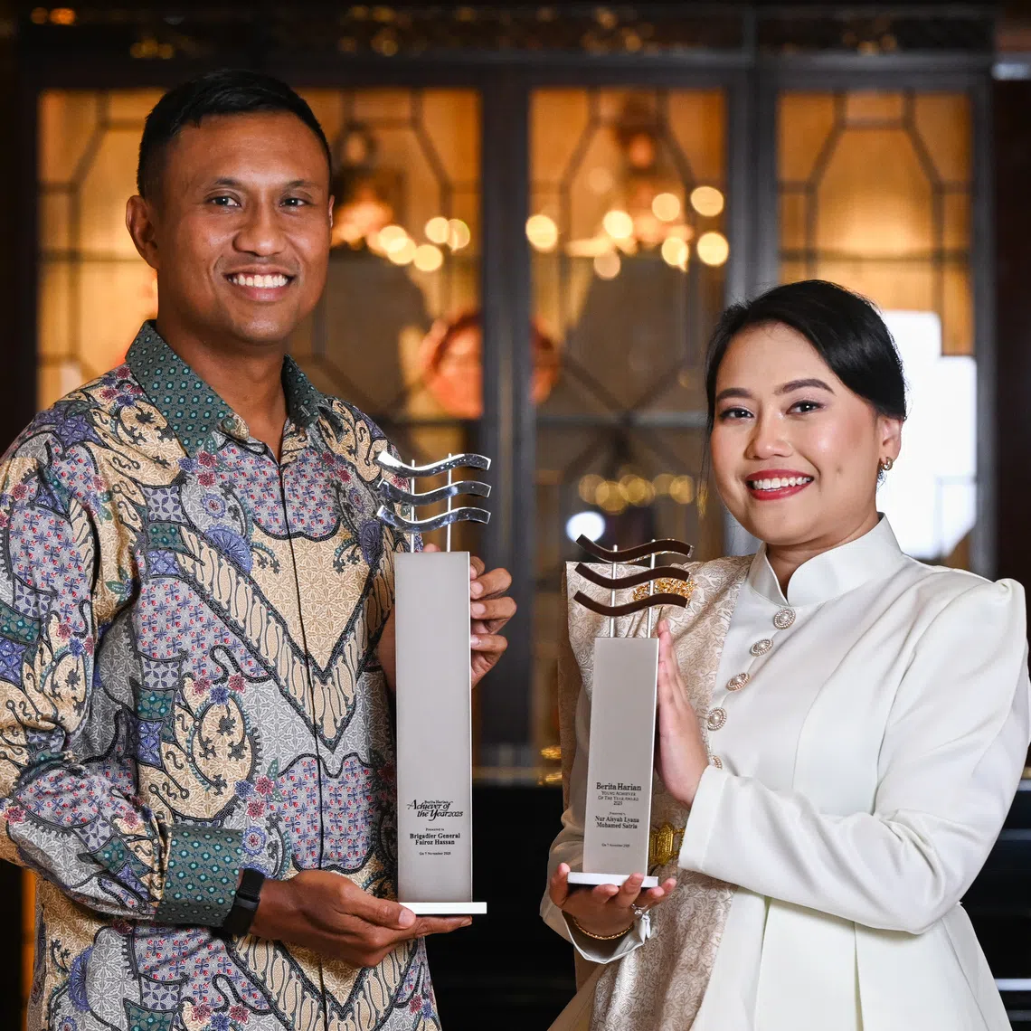Berita Harian’s Achiever of the Year recipient, Brigadier-General Fairoz Hassan, and Young Achiever of the Year recipient, writer Nur Aisyah Lyana Mohamed Satria.