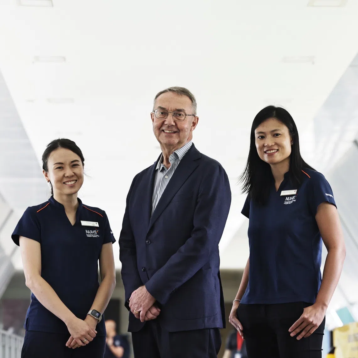 (From left) NUHS@Home nurse clinician Claudia Tan, Mr Paul Faulkner and Dr Stephanie Ko, lead for NUHS@Home.