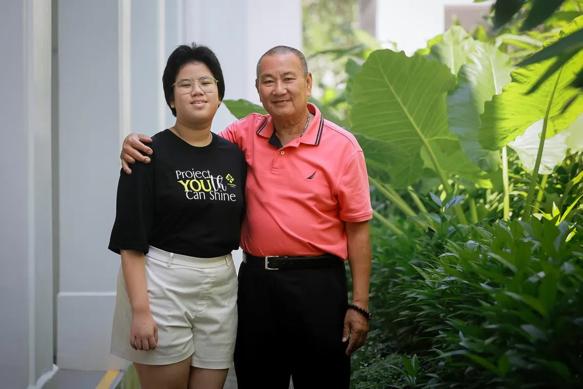 Mr Lee Kia Por, 67, with his daughter Ruby Lee, 17, at the Chinese Development Assistance Council office in Tanjong Katong, June 13, 2023.  They received help on multiple fronts.