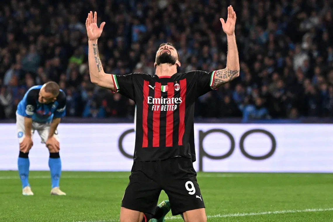 AC Milan's Olivier Giroud celebrates scoring their first goal.