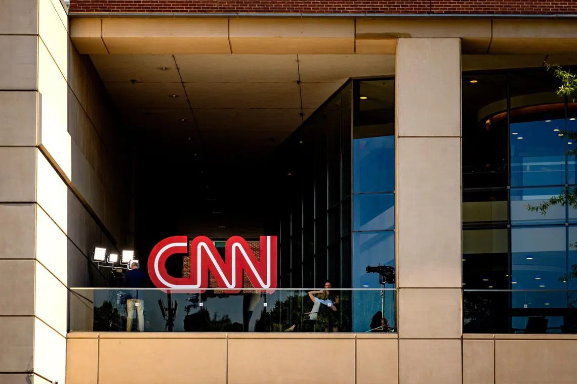 CNN will merge its news-gathering and digital news teams, invest in video operations and launch pay-per-view news products.