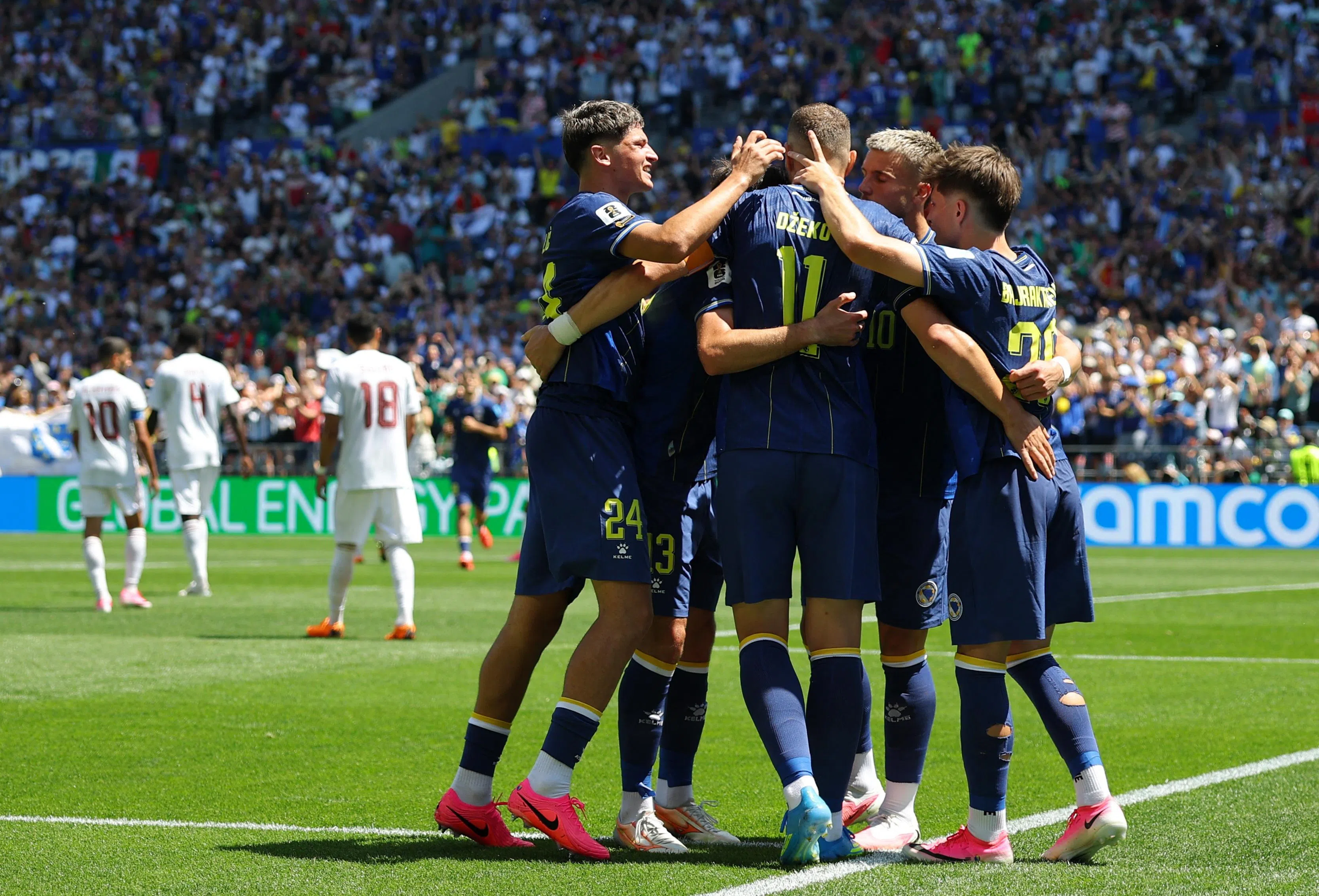 Soccer Football - FIFA World Cup 2026 - Group B - Bosnia and Herzegovina v Qatar - Seattle Stadium, Seattle, Washington, U.S. - June 24, 2026 Bosnia and Herzegovina's Edin Dzeko and teammates celebrate their second goal, an own goal scored by Qatar's Sultan Albrake REUTERS/Carlos Barria