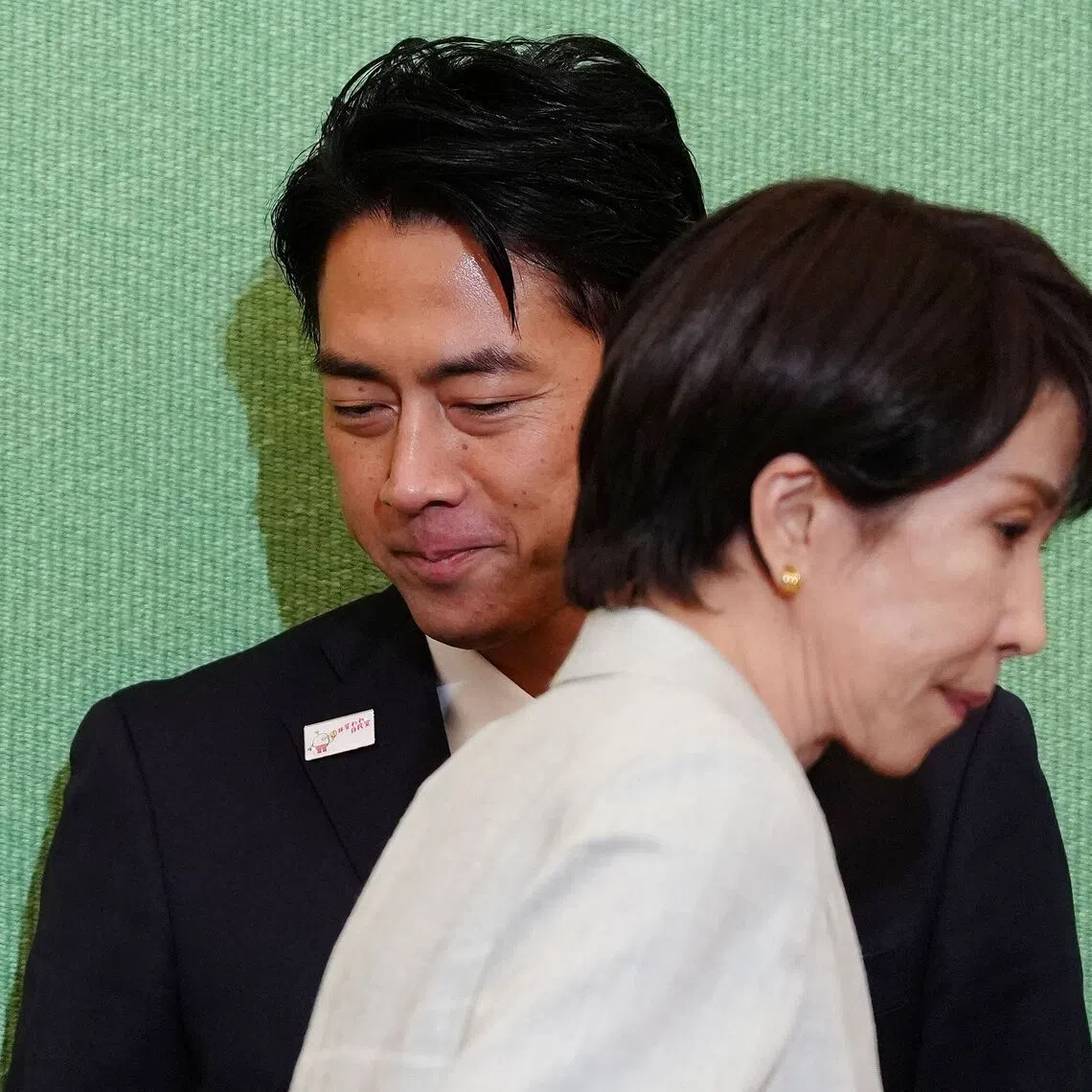 It appears that Japan's Agriculture Minister Shinjiro Koizumi (left) and former economic security minister Sanae Takaichi offer the country different future pathways in a daunting geopolitical landscape.