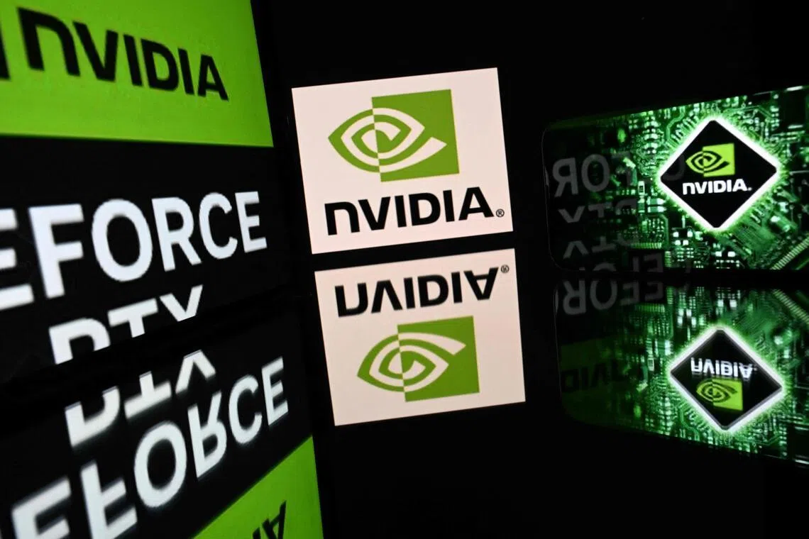 (FILES) This illustration photograph shows screens displaying the logo of US chipmaker Nvidia in Toulouse, southwestern France, on February 18, 2026. Nvidia on February 25, 2026 reported blockbuster quarterly results that blew past Wall Street expectations, posting record revenue of $68.1 billion as insatiable demand for its artificial intelligence chips showed no sign of cooling. The figures -- up 73 percent from a year ago and well above the $65.7 billion analysts had forecast -- sent a powerful signal that the technology buildout dominated by Nvidia that underpins the global AI boom remains in full swing. (Photo by Lionel BONAVENTURE / AFP)