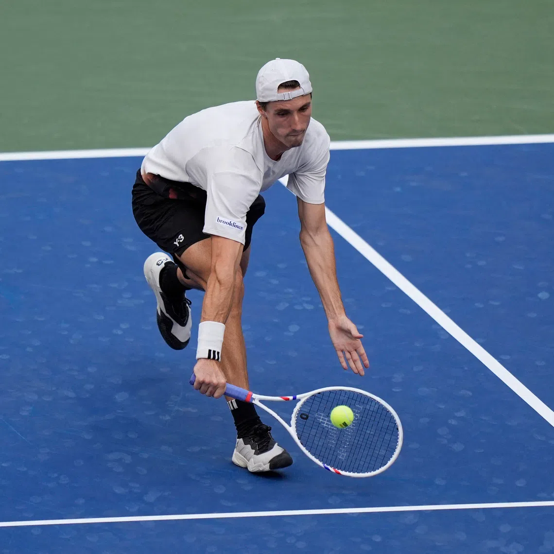 Tennis - U.S. Open - Flushing Meadows, New York, United States - September 4, 2025 Britain's Joe Salisbury in action with Britain's Neal Skupski during the men's doubles semi final match against New Zealand's Michael Venus and India's Yuki Bhambri REUTERS/Eduardo Munoz