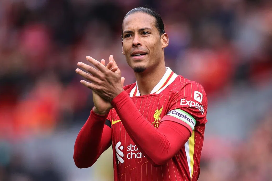 Soccer Football - Premier League - Liverpool v West Ham United - Anfield, Liverpool, Britain - April 13, 2025 Liverpool's Virgil van Dijk celebrates after the match REUTERS/David Klein/ File Photo