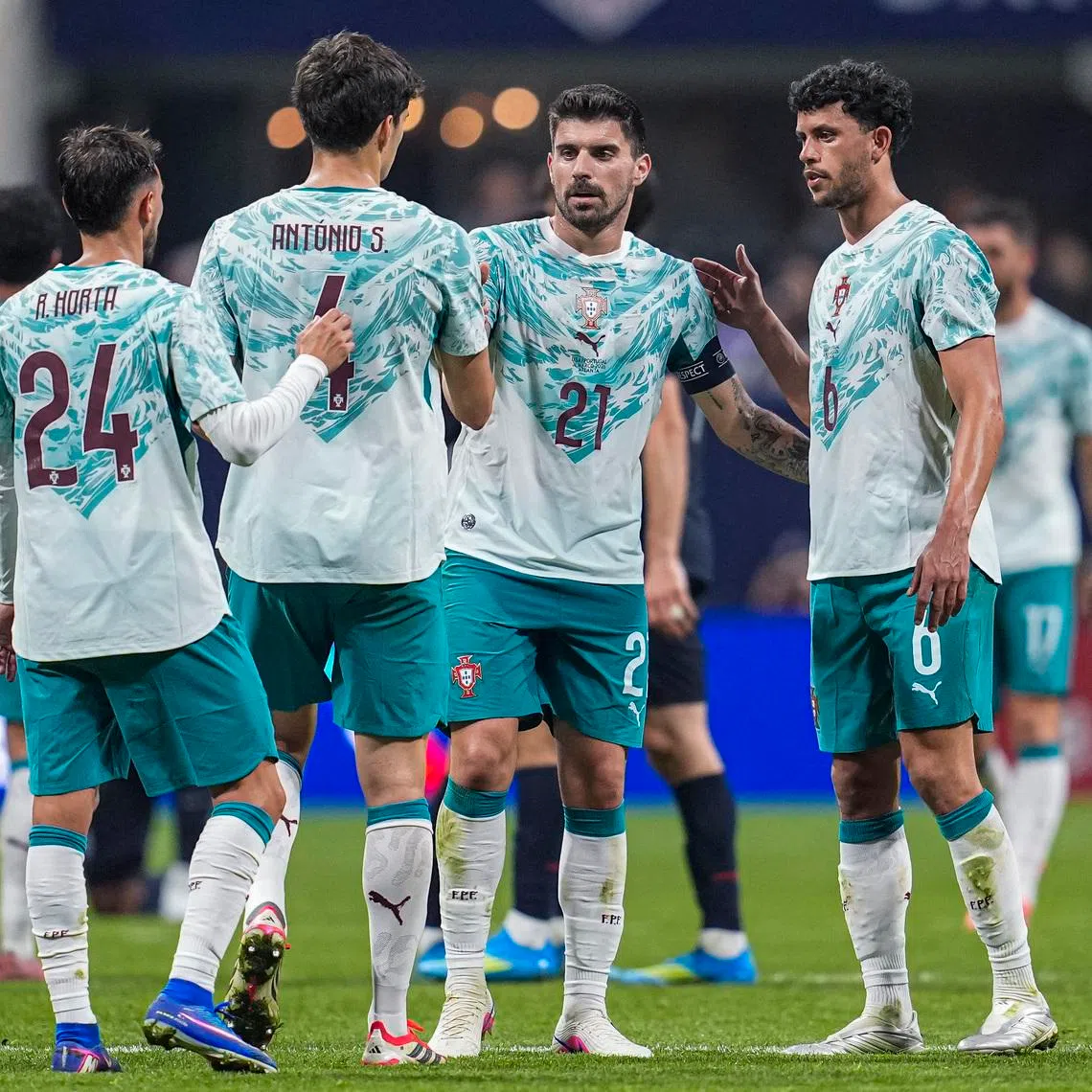 Mar 31, 2026; Atlanta, Georgia, USA; Portugal players react with teammates and United States players after the match at Mercedes-Benz Stadium. Mandatory Credit: Dale Zanine-Imagn Images