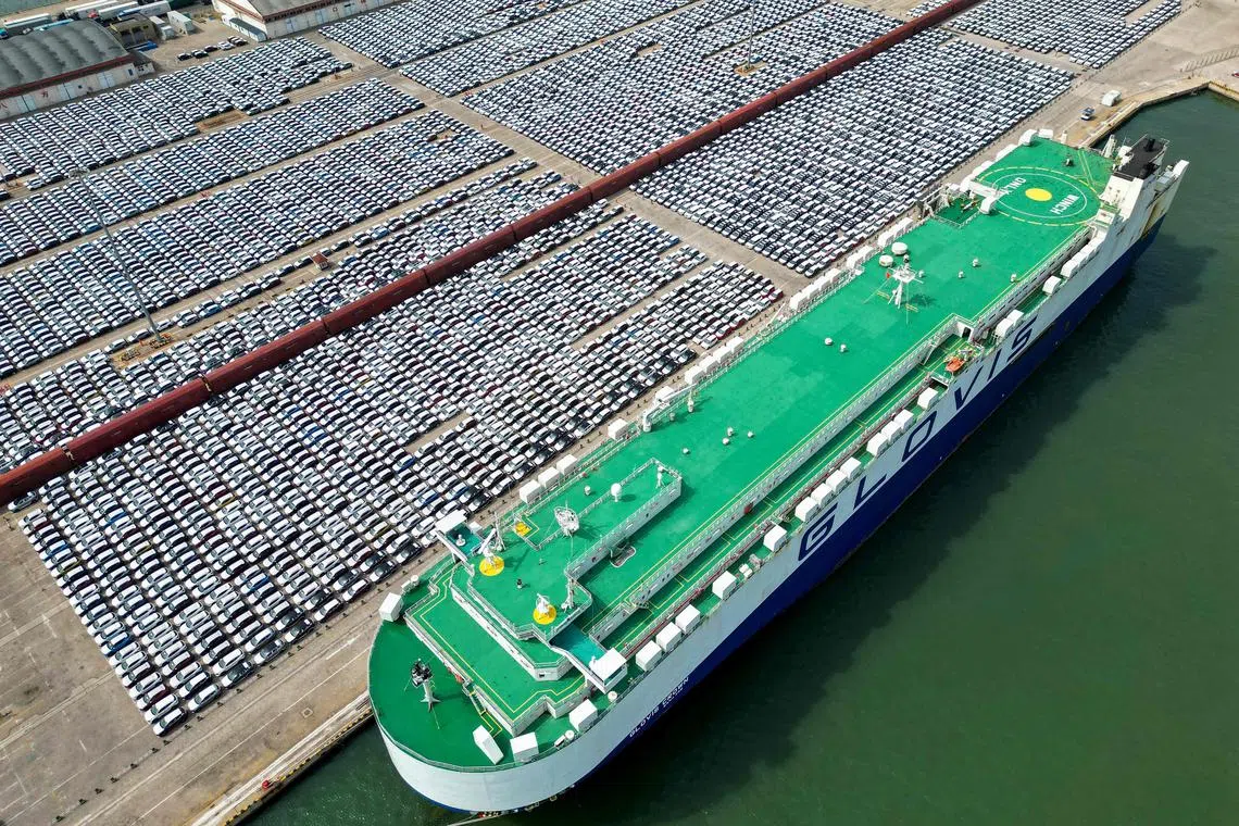 Rows of cars for export at Yantai port, in China's eastern Shandong province. 