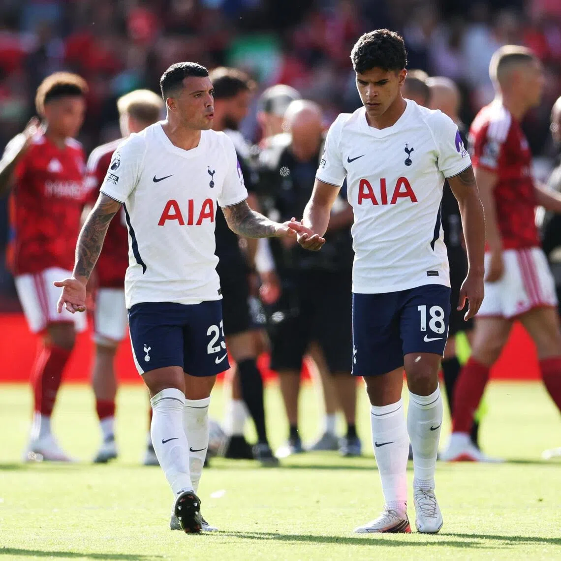 Tottenham Hotspur’s Pedro Porro and Mateus Fernandes after the match against Forest.