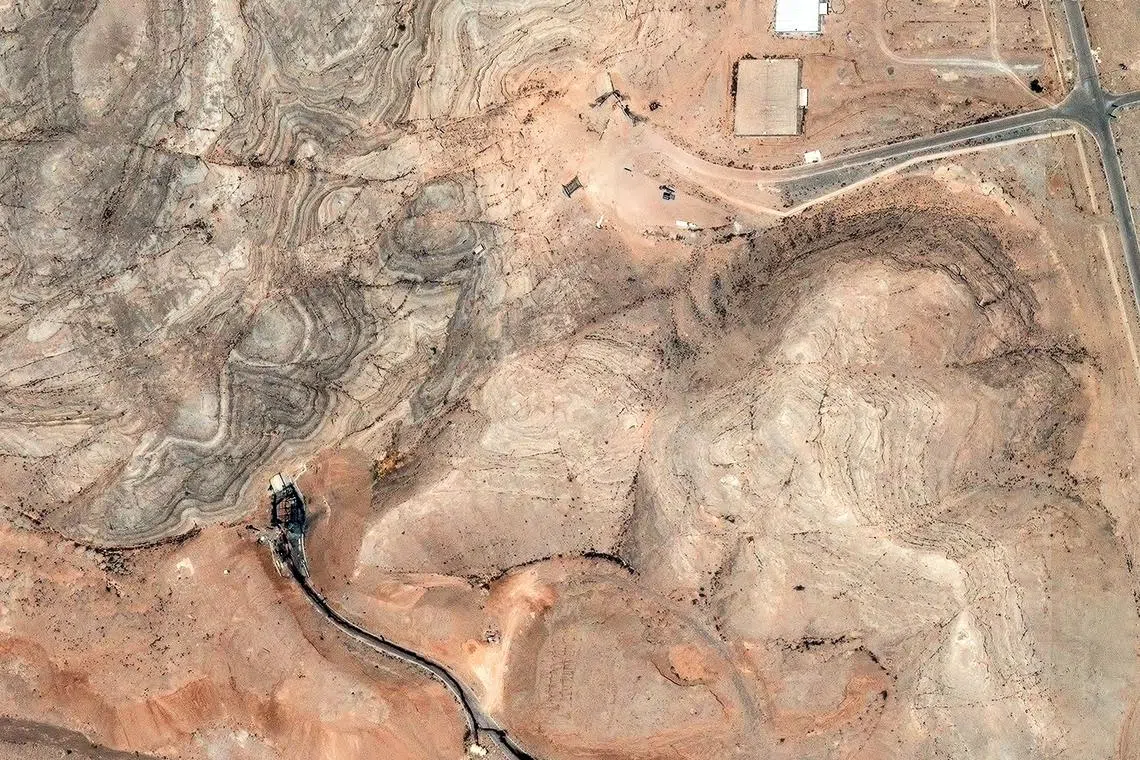 FILE PHOTO: A satellite image shows damage to the tunnel entrances of the Isfahan Nuclear Technology Research Center, following U.S. airstrikes amid the Iran-Israel conflict, in Isfahan, Iran, June 22, 2025. Maxar Technologies/Handout via REUTERS/File Photo