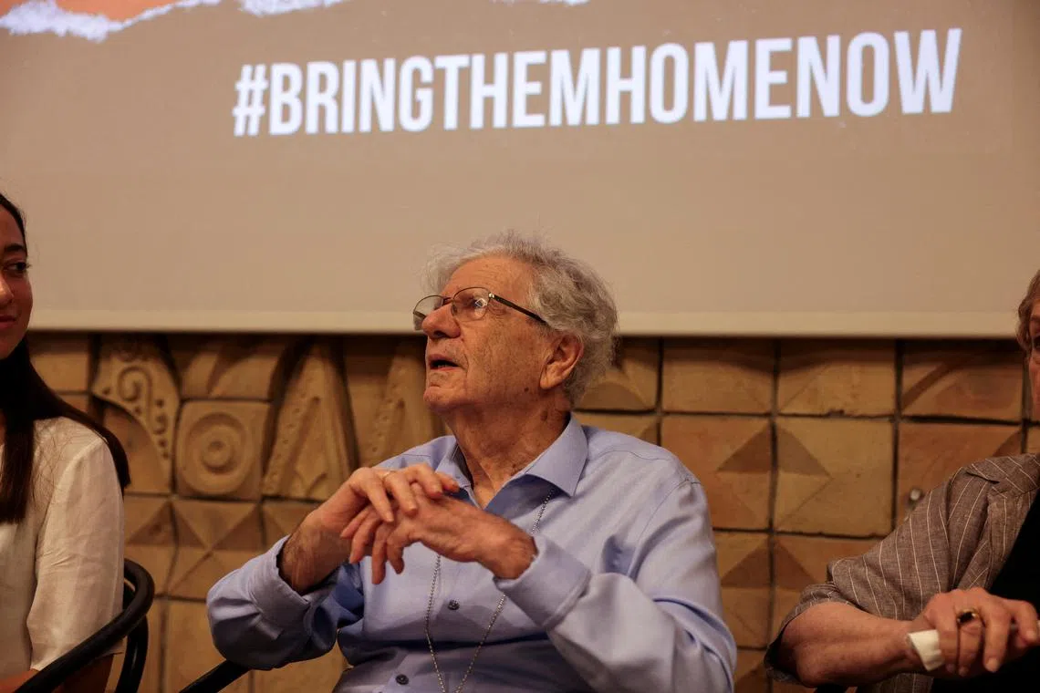 FILE PHOTO: Former Israeli Supreme Court President, Aharon Barak, accuses Palestinian Islamist group Hamas of crimes against humanity and calls for the international community to take action during a press conference together with some of the hostage's family in Tel Aviv, Israel November 3, 2023 REUTERS/Ronen Zvulun/File Photo