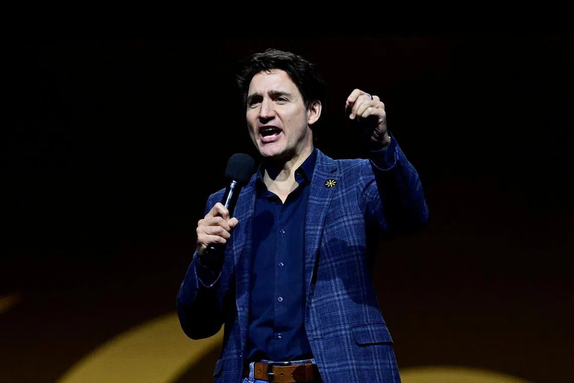 FILE PHOTO: Canada's Prime Minister Justin Trudeau speaks during the closing ceremony of the Invictus Games at Rogers Arena in Vancouver, British Columbia, Canada, February 16, 2025. REUTERS/Jennifer Gauthier/File Photo