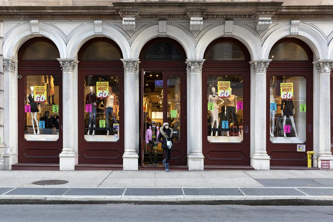 FILE Ñ Outside a store having a closing sale in New York, Dec. 3, 2020. Adhering to antitrust regulation while negotiating collective sustainability targets is proving tougher to navigate for some in the fashion industry. (Harisson Weinstein/The New York Times)