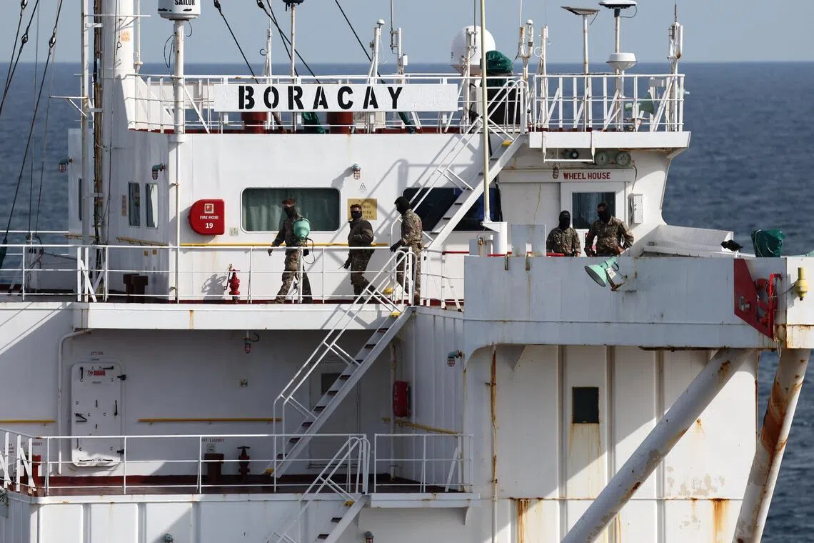 French soldiers are seen on the oil tanker Boracay (also called Pushpa), a vessel being investigated by French authorities and suspected of belonging to the so-called "shadow fleet" involved in the Russian oil trade, off the coast of western France, on Oct 2.