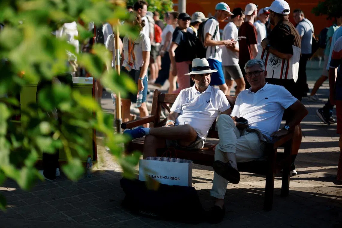 Tennis - French Open - Roland Garros, Paris, France - May 26, 2026 Spectators are seen outside the courts during the matches REUTERS/Stephanie Lecocq