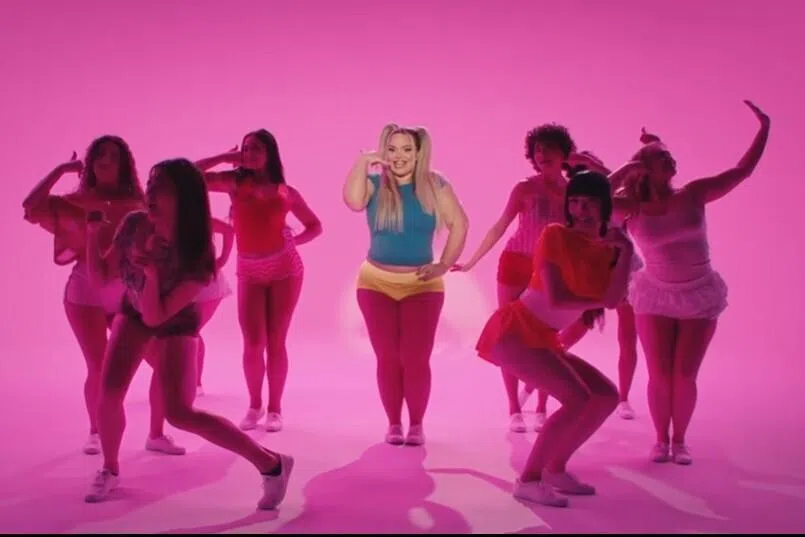 Trisha Paytas (in blue) performs synchronised choreography similar to that of K-pop idol groups