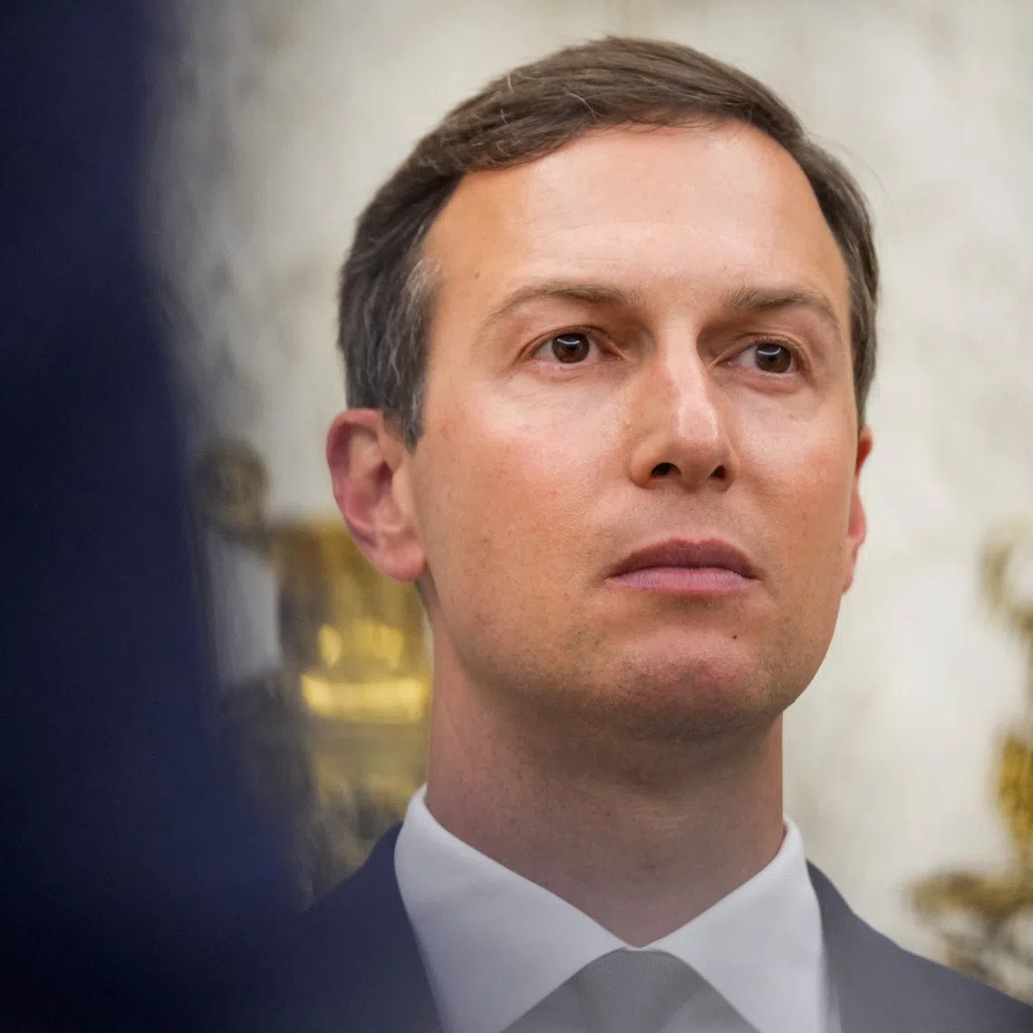 FILE PHOTO: Jared Kushner looks on during a swearing-in ceremony of Special Envoy Steve Witkoff in the Oval Office at the White House in Washington, D.C., U.S., May 6, 2025. REUTERS/Kent Nishimura/File Photo