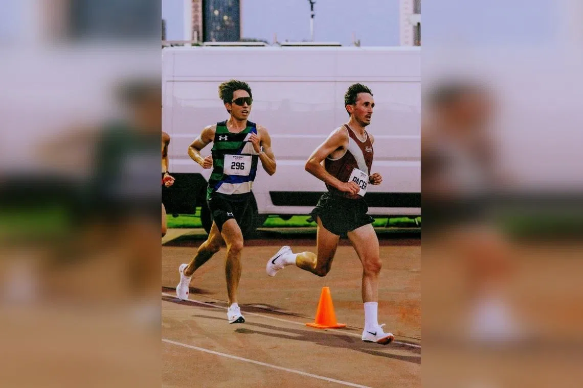 Distance runner Soh Rui Yong (left), with his pacer Andy Fyfe, at the Tracksmith Twilight 5000 event in London, where the Singaporean broke the 5,000m national record.