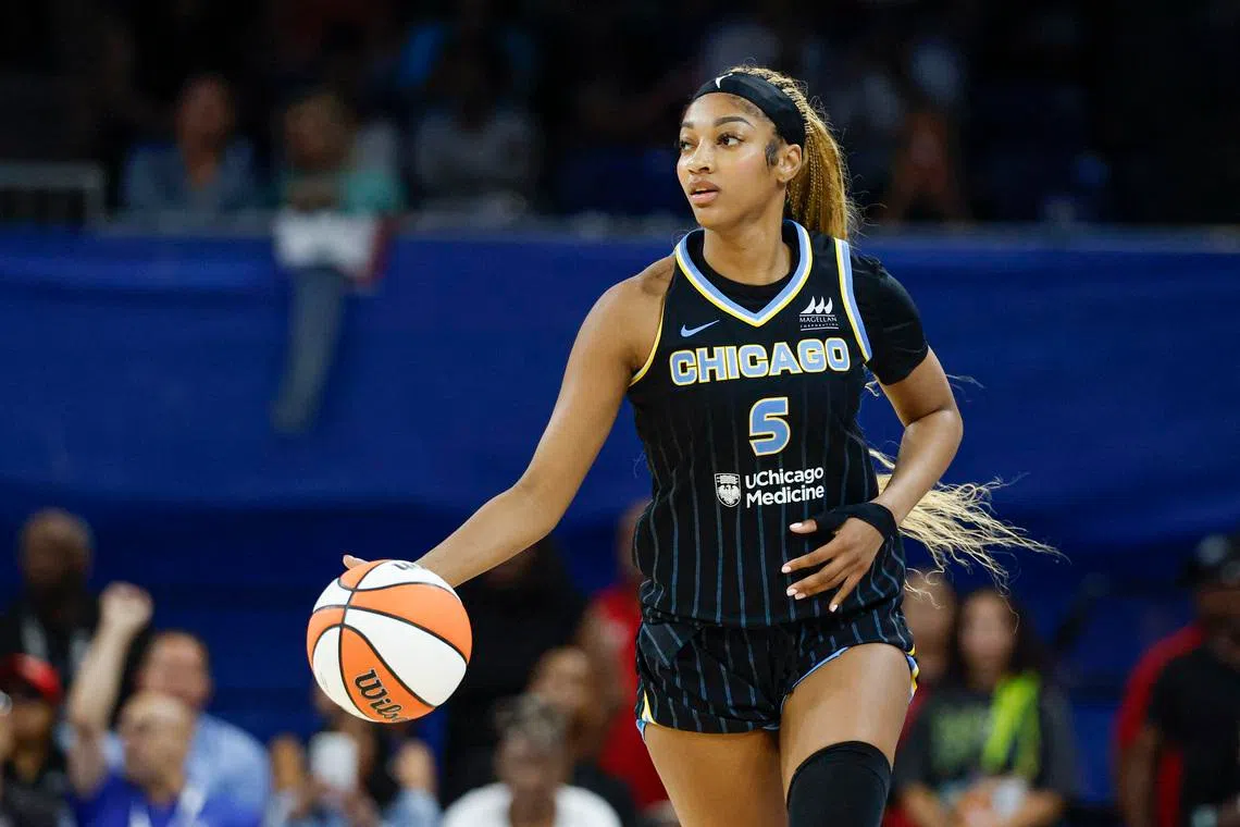 Jul 9, 2025; Chicago, Illinois, USA; Chicago Sky forward Angel Reese (5) brings the ball up court against the Dallas Wings during the second half of a WNBA game at Wintrust Arena. Mandatory Credit: Kamil Krzaczynski-Imagn Images