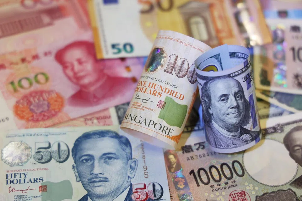 The Singapore’ dollar was up 0.6 per cent to 1.2922 per US dollar as at 12.07am local time. Photo: SPH