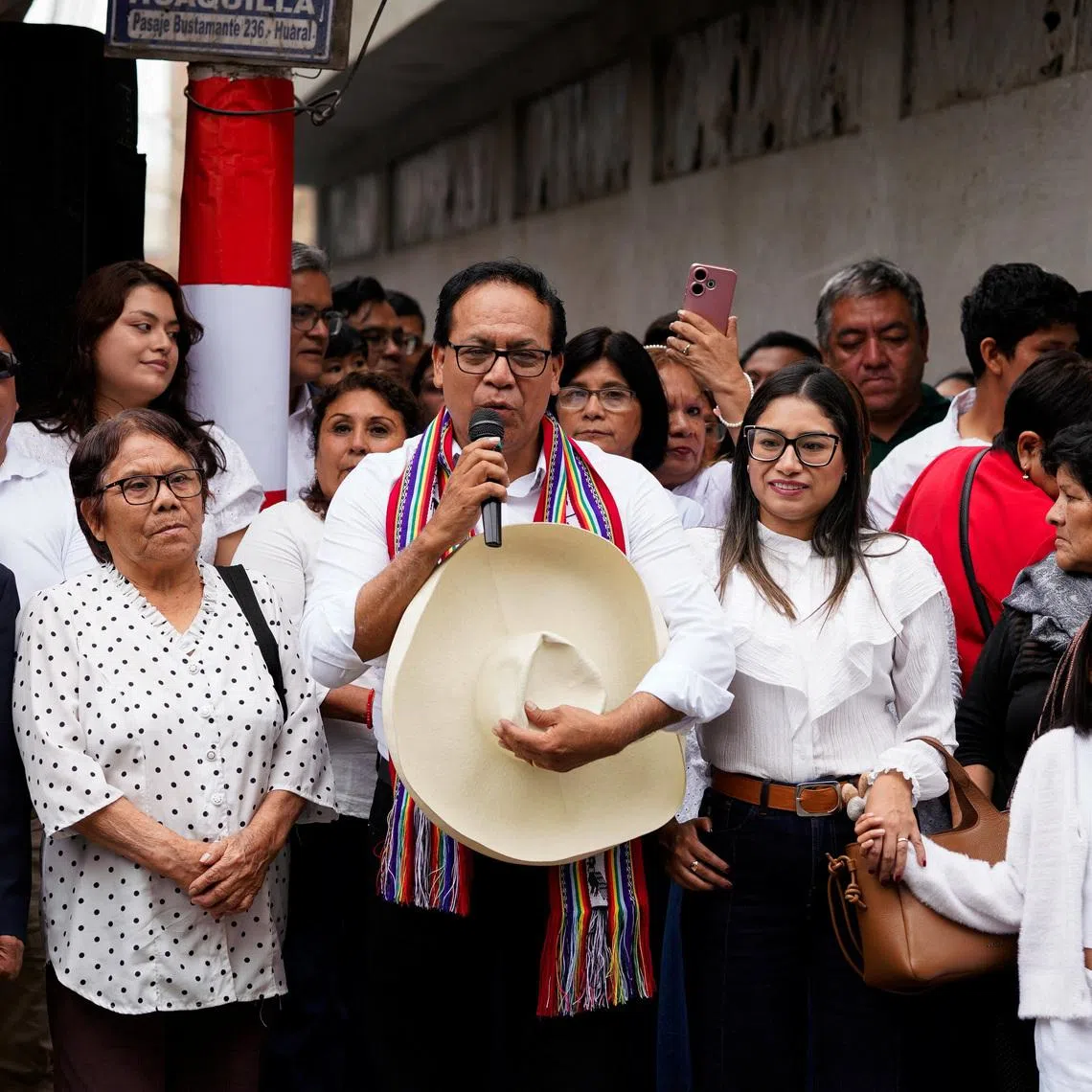 Left-wing presidential candidate Roberto Sanchez speaks to supporters next to his family members before casting his vote in a runoff election against conservative candidate Keiko Fujimori, in Huaral, Peru, June 7, 2026. REUTERS/Leslie Moreno