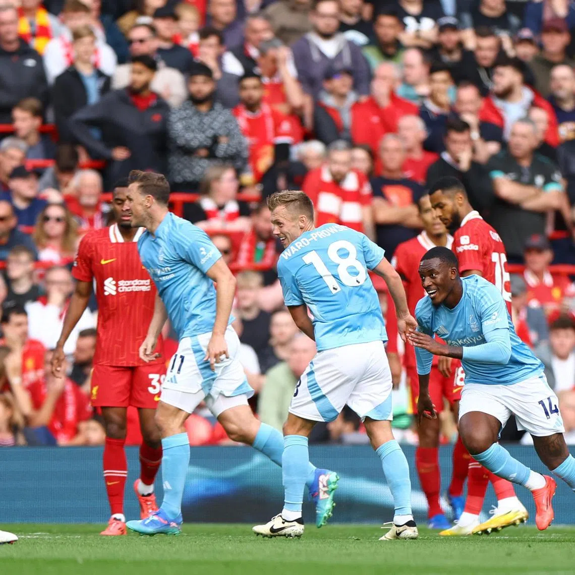Nottingham Forest winger Callum Hudson-Odoi (far right) peeling away to celebrate his goal against Liverpool at Anfield on Sept 14. Forest won 1-0 in the English Premier League encounter.