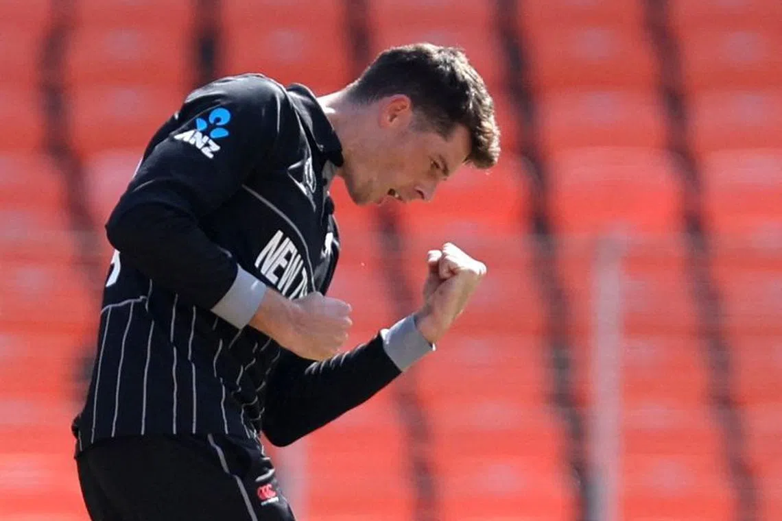 Cricket - ICC Cricket World Cup 2023 - England v New Zealand - Narendra Modi Stadium, Ahmedabad, India - October 5, 2023 New Zealand's Mitch Santner celebrates after taking the wicket of England's Jonny Bairstow caught by Daryl Mitchell REUTERS/Amit Dave/file photo