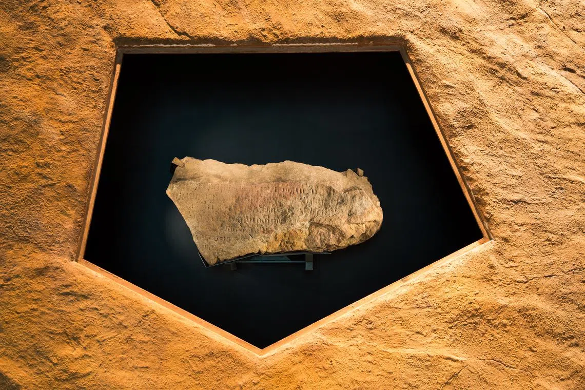 The stone is a fragment of a bigger slab, once welcoming visitors at the mouth of the Singapore River.