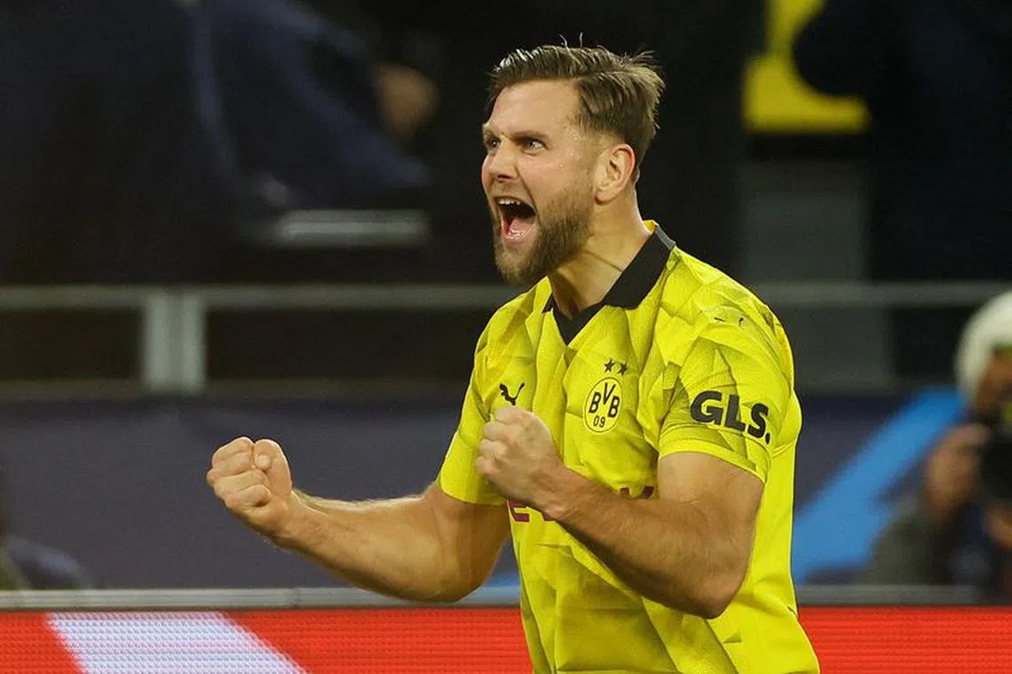 Soccer Football - Champions League - Group F - Borussia Dortmund v Newcastle United - Signal Iduna Park, Dortmund, Germany - November 7, 2023 Borussia Dortmund's Niclas Fullkrug celebrates scoring their first goal REUTERS/Wolfgang Rattay