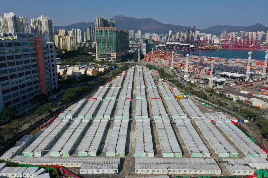 An aerial view shows Tsing Yi Covid Isolation camp in Hong Kong on January 24, 2023. - Seven Hong Kong quarantine facilities including Tsing Yi, built by the government providing more than 40,000 beds are currently unoccupied. 