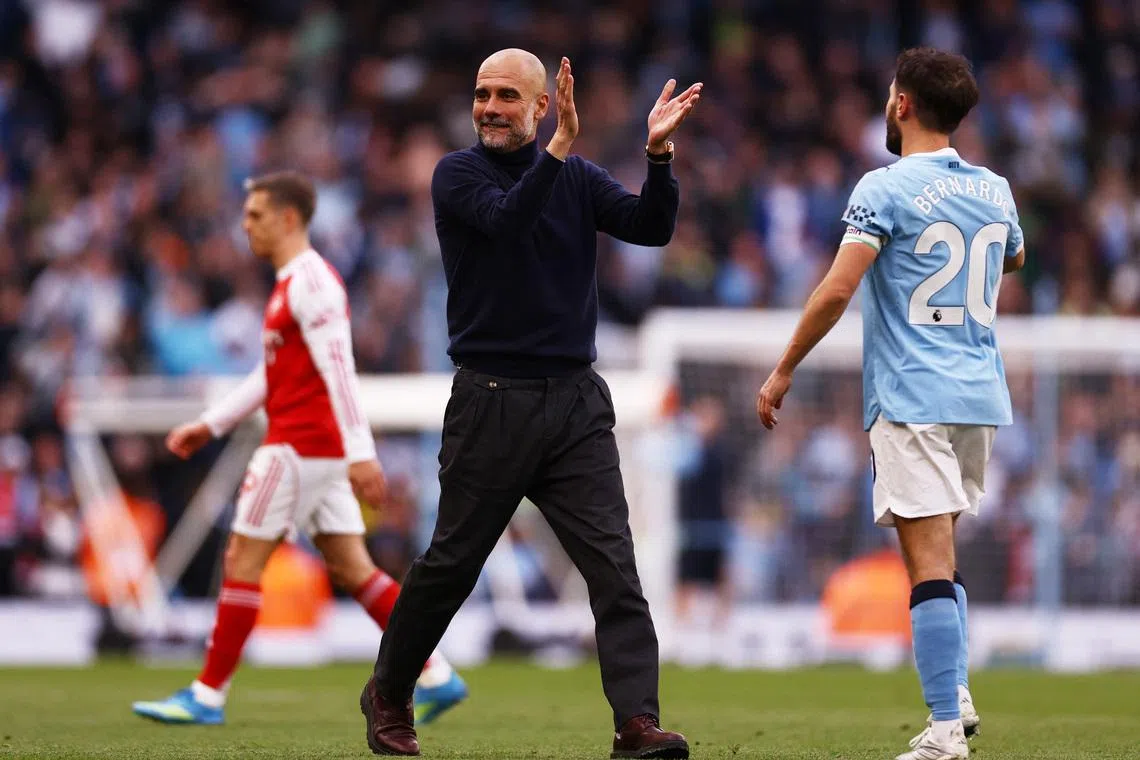 Soccer Football - Premier League - Manchester City v Arsenal - Etihad Stadium, Manchester, Britain - April 19, 2026 Manchester City manager Pep Guardiola celebrates after the match Action Images via Reuters/Lee Smith