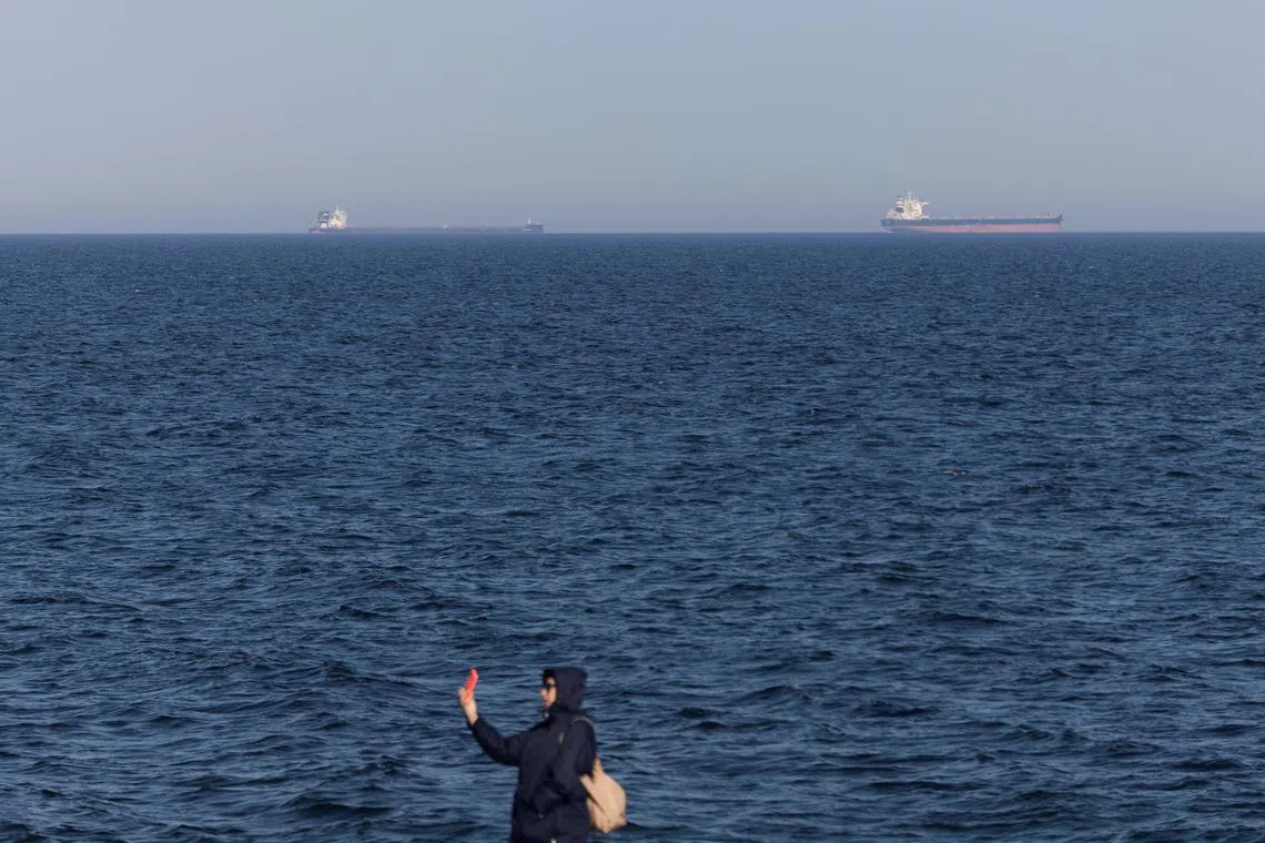 Cargo vessels are seen in the Black Sea, amid Russia's attack on Ukraine, near Odesa, Ukraine March 22, 2025. REUTERS/Valentyn Ogirenko/File Photo