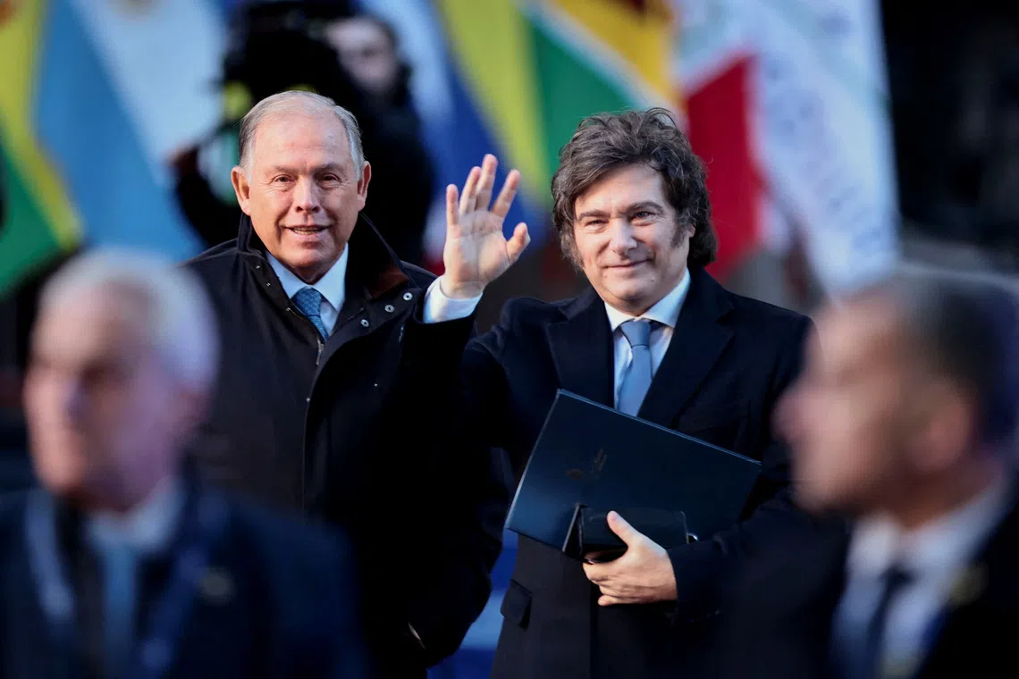 Argentine President Javier Milei and Argentine Foreign Minister Gerardo Werthein attend the Summit of Presidents of MERCOSUR, in Buenos Aires, Argentina, July 3, 2025. REUTERS/Alessia Maccioni