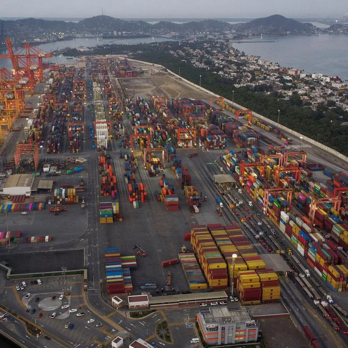 FILE PHOTO: A drone view shows the Manzanillo seaport as Mexican authorities bet on positive economic growth and the strength of global trade building an expansion to the port named \"Nuevo Manzanillo\", in Manzanillo, Mexico, April 22, 2025. REUTERS/Daniel Becerril/File Photo