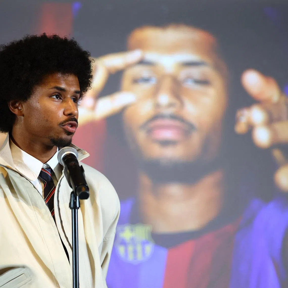 Soccer Football - FC Barcelona unveil new signing Karim Adeyemi - Spotify Camp Nou, Barcelona, Spain - July 23, 2026 Karim Adeyemi speaks after signing for FC Barcelona REUTERS/Albert Gea