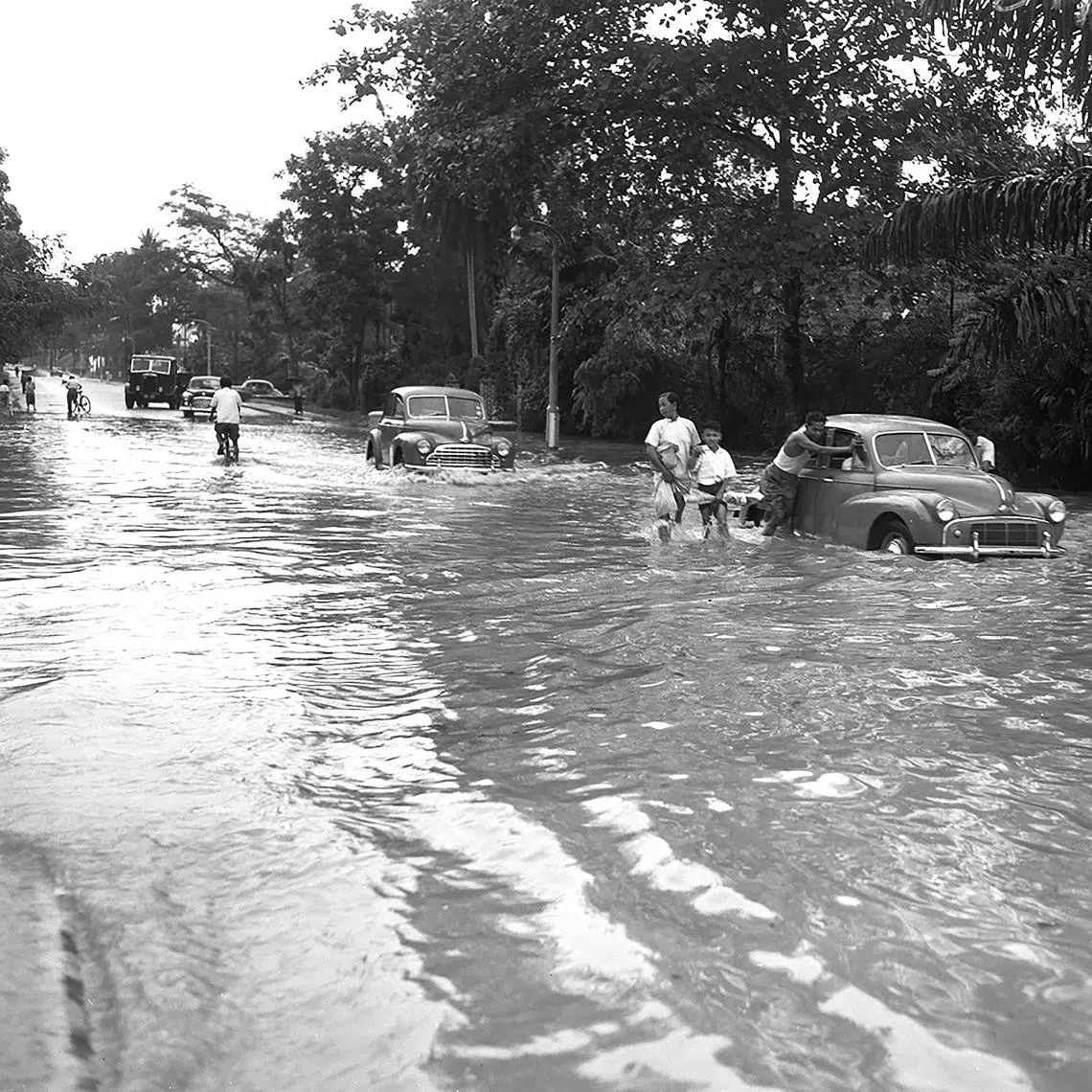 On Feb 20, 1953, 100mm of rain reportedly fell in two hours in Singapore, causing widespread floods and chaos, including in Scotts Road (above).