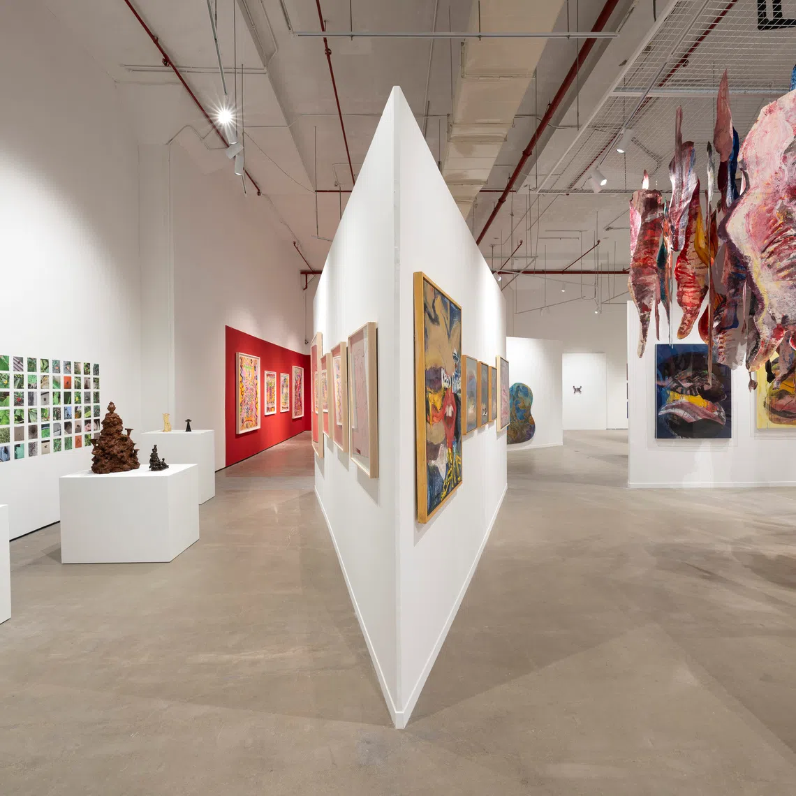 Works by Wong Keen (right) and Dusadee Huntrakul (left) at S.E.A Focus 2025.