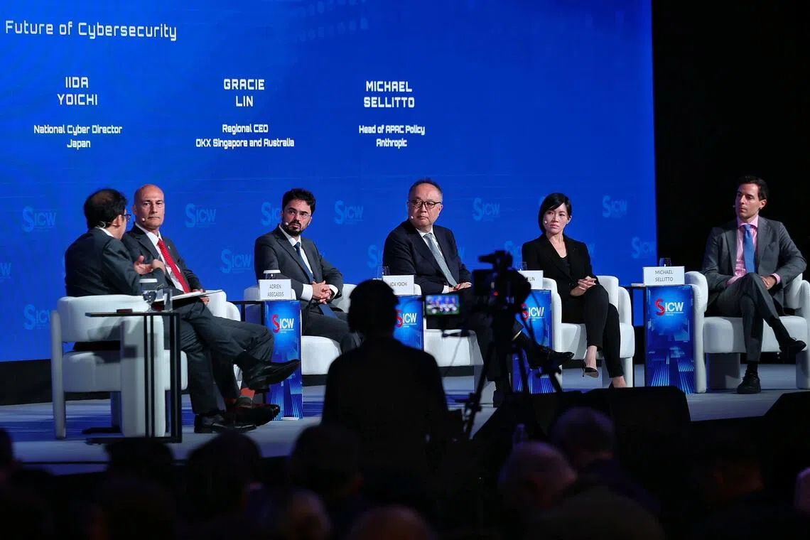 (From left) He Ruimin, Chief AI Officer at Ministry of Digital Development and Information; Rajiv Gupta, Head of the Canadian Centre for Cyber Security; Adrien Abecassis, France's Ambassador for Digital Affairs and Artificial Intelligence; Iida Yoichi, Japan's National Cyber Director; Gracie Lin, Regional CEO of OKX Singapore and Australia; and Michael Sellitto, Head of APAC Policy at Anthropic; having a panel discussion on The Race to the Frontier ? AI and the Future of Cybersecurity at the Singapore International Cyber Week 2026 in Marina Bay Sands Expo and Convention Centre on Oct 13, 2026. ST PHOTO: KEVIN LIM sacyber13