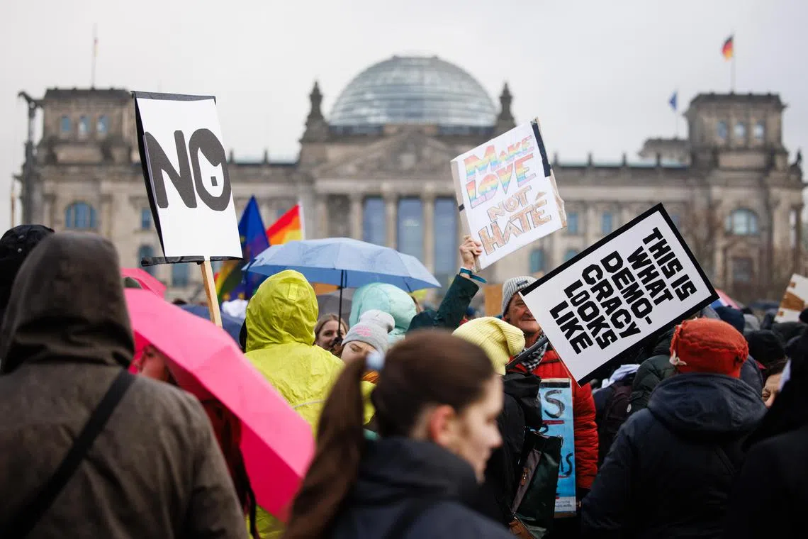 People flocked to the Reichstag parliament building in Berlin to protest against Germany's far-right Alternative for Germany (AfD) party.