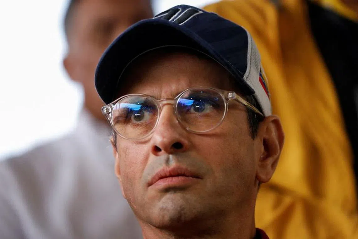 FILE PHOTO: Venezuelan opposition leader Henrique Capriles looks on after being announced as the "Primero Justicia" (Justice First) party's candidate for the October presidential primary, in Caracas, Venezuela March 10, 2023. REUTERS/Leonardo Fernandez Viloria/File Photo