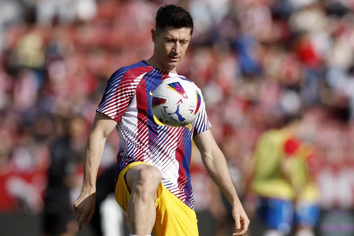 FILE PHOTO: Soccer Football - LaLiga - Girona v FC Barcelona - Estadi Montilivi, Girona, Spain - May 4, 2024 FC Barcelona's Robert Lewandowski during the warm up before the match REUTERS/Albert Gea/File Photo