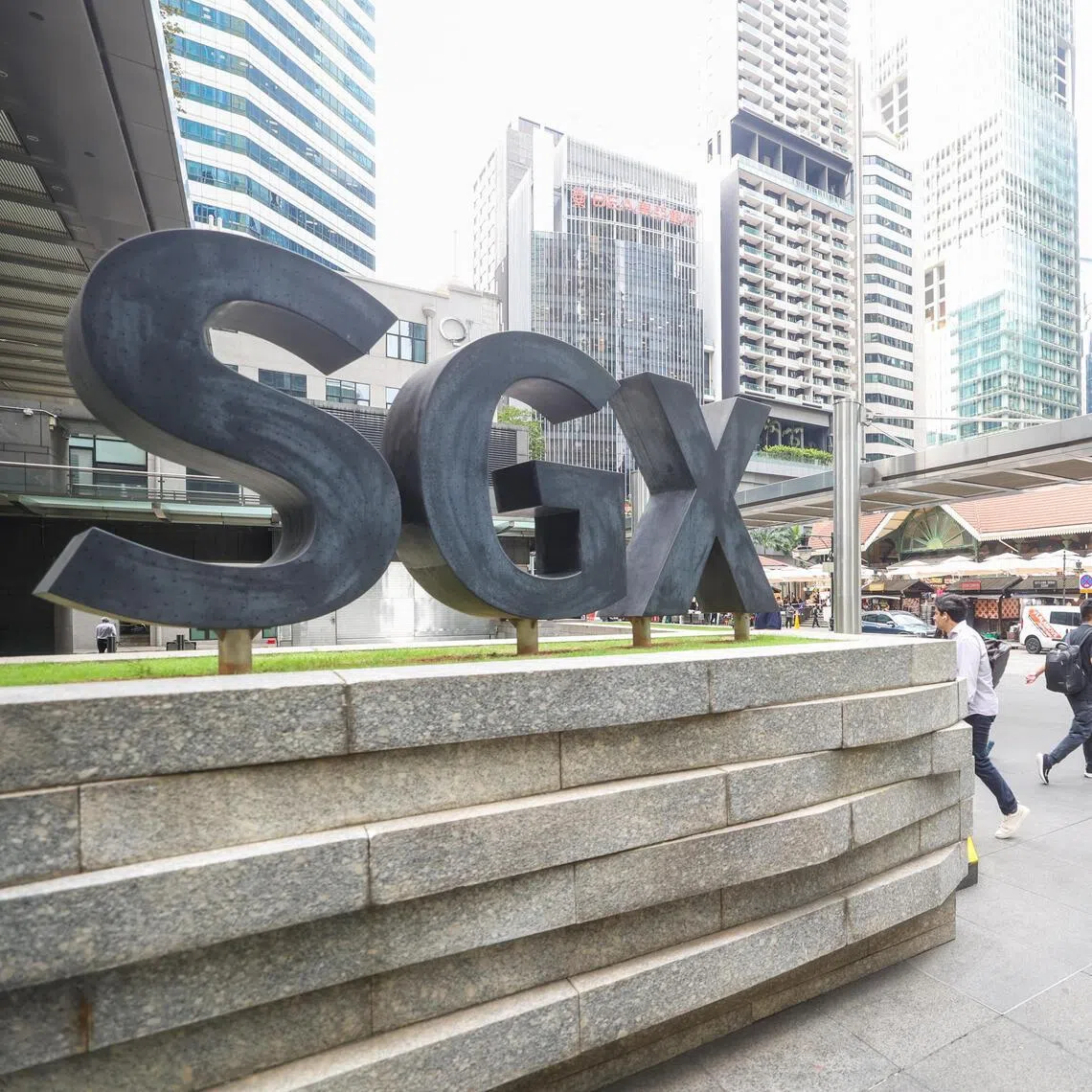 The Straits Times Index slid 1.8 per cent to trade at 4,906.81 at midday.