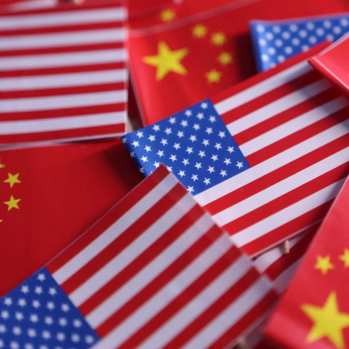 U.S. and Chinese flags are seen in this illustration taken March 20, 2025. REUTERS/Dado Ruvic/Illustration