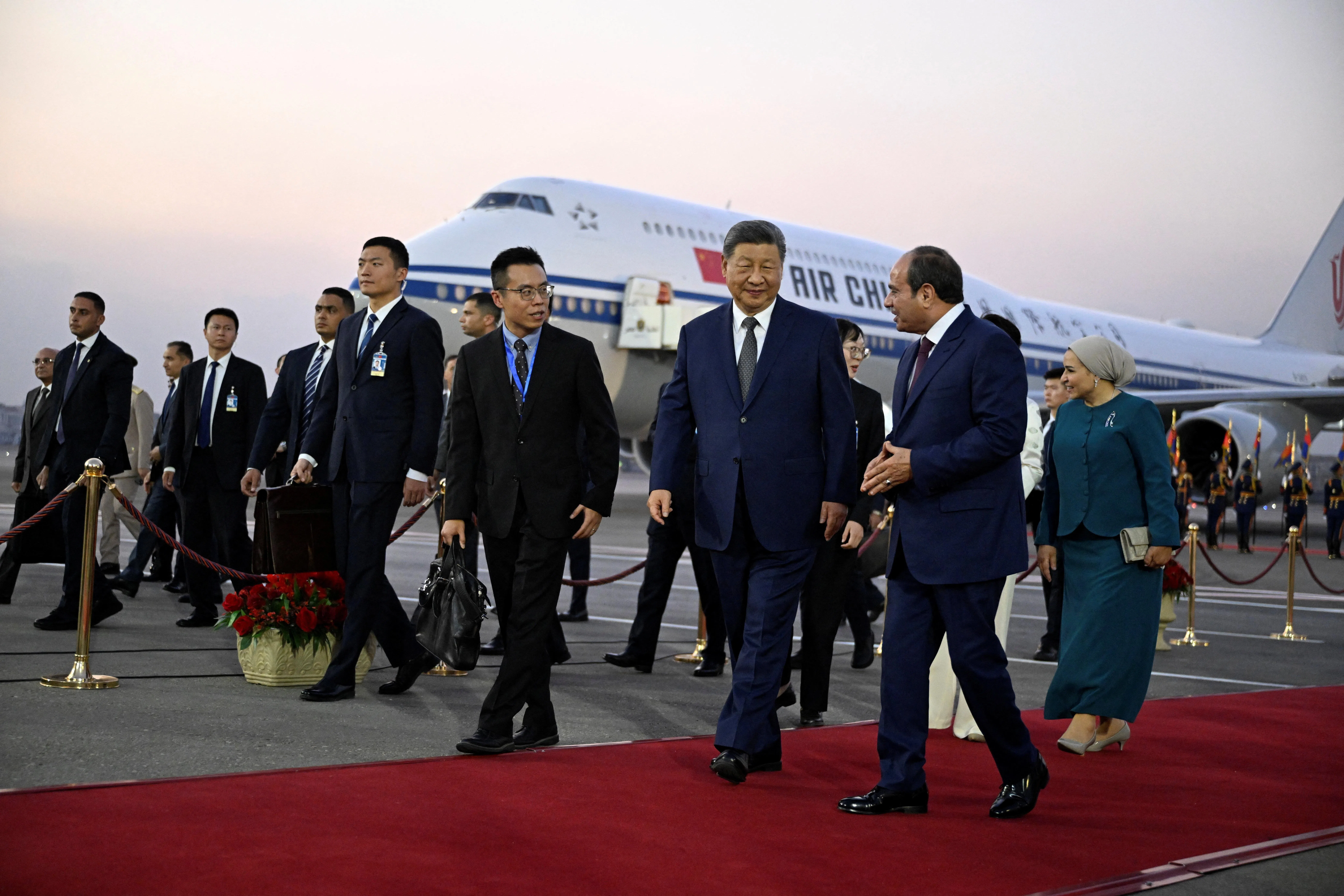 China's President Xi Jinping walks with his his Egyptian counterpart Abdel Fattah al-Sisi followed by their wives Peng Liyuan and Entissar Amer upon their arrival at the Cairo International Airport, Egypt, September 1, 2026. Khaled Desouki/Pool via REUTERS