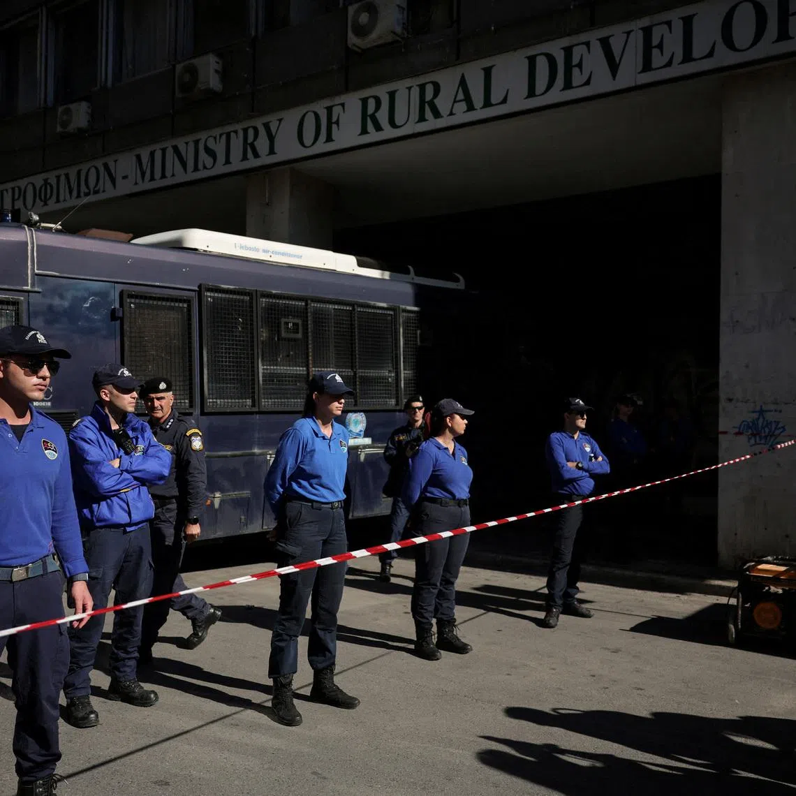 FILE PHOTO: Police protects the Ministry of Rural Development and Food, during farmers’ protest over delays to EU subsidies due to farm fraud scandal, in Athens, Greece, November 11, 2025. REUTERS/Louisa Gouliamaki/File Photo